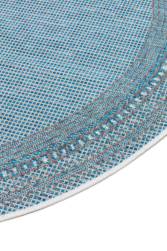 Dies ist der Harper Rund Teppich in der Farbe Blau von Brom-Living