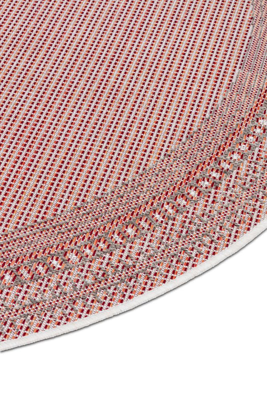 Dies ist der Harper Rund Teppich in der Farbe Rot von Brom-Living