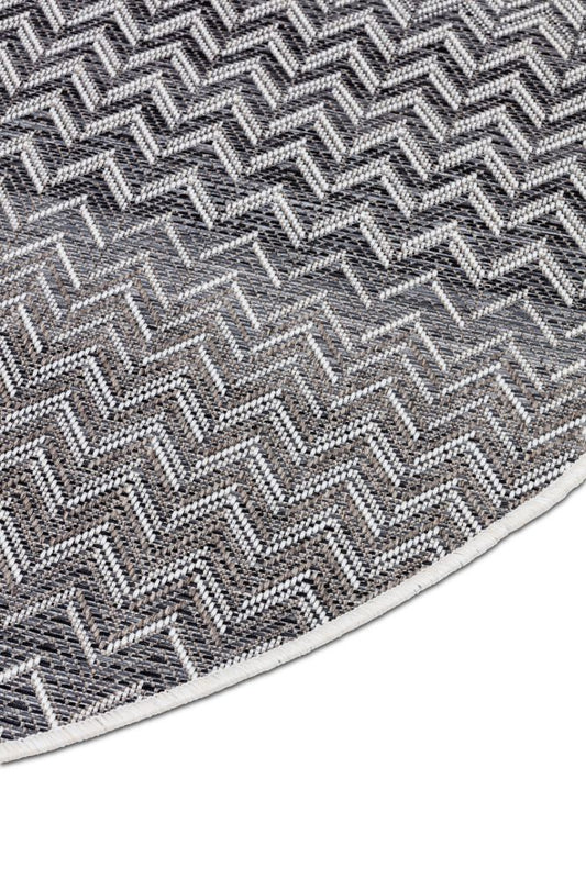 Dies ist der Ziggy Teppich Rund von Brom-Living in Anthrazit/Beige